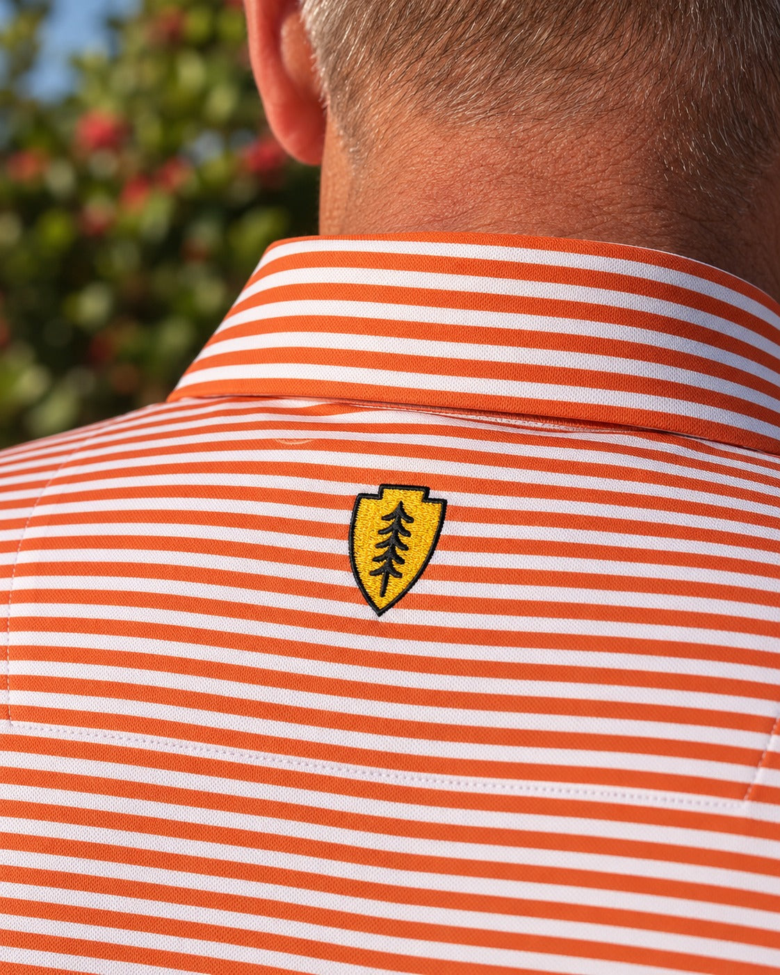 Clark Stripe Performance Mesh Polo - Burnt Orange
